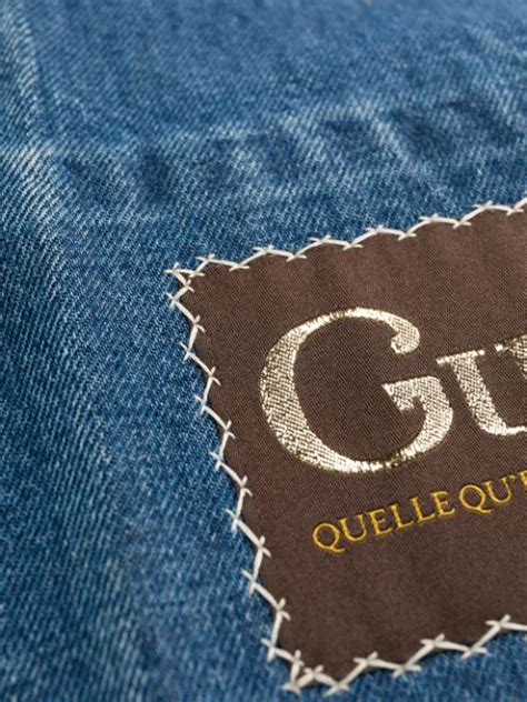 gucci jeans tag